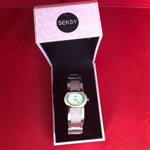 Seksy pink leather and stainless steel watch. NWOT